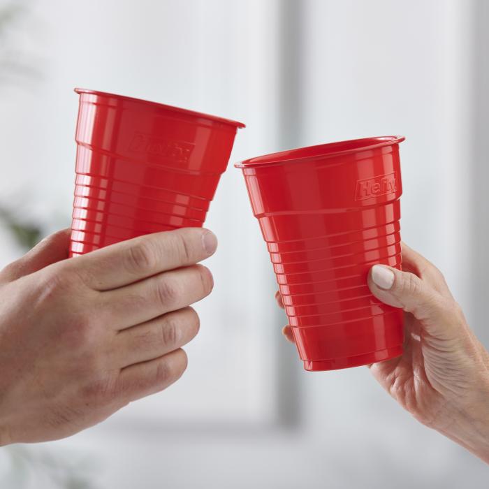 Two Hefty ECOSAVE Compostable Party Cups in a cheers