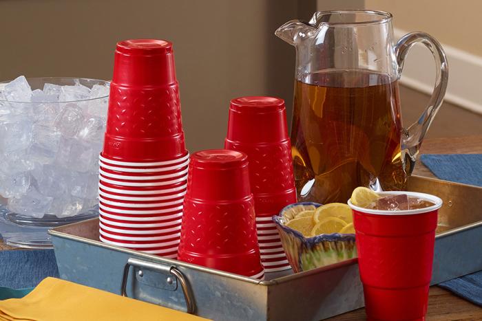 Red Party Cups on a tray with Iced Tea Pitcher