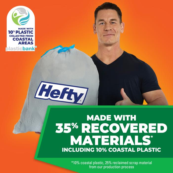 John Cena holding a Hefty Trash Bag