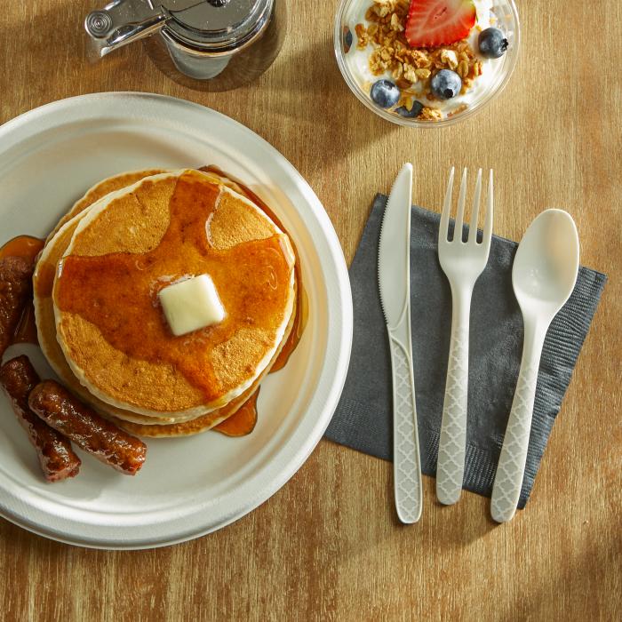 Hefty ECOSAVE assorted cutlery alongside a stack of pancakes