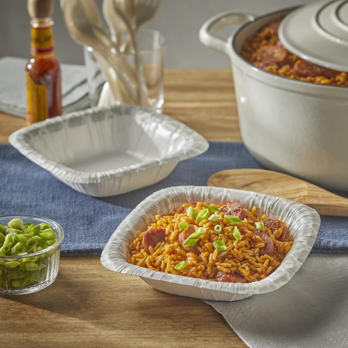 Jambalaya in a Hefty Extra Deep paper bowl on a kitchen table