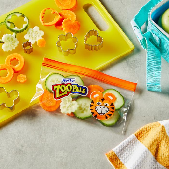 carrots and cucumbers in a sealed Hefty Zoo Pals snack size storage bag